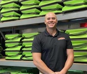 Image of Stephen Gallimore II, General Manager of SERVPRO of LBL North, wearing a black polo with the SERVPRO emblem.